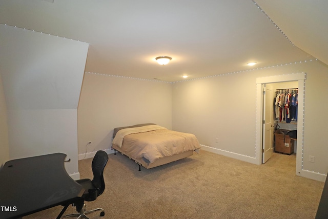 carpeted bedroom featuring a closet