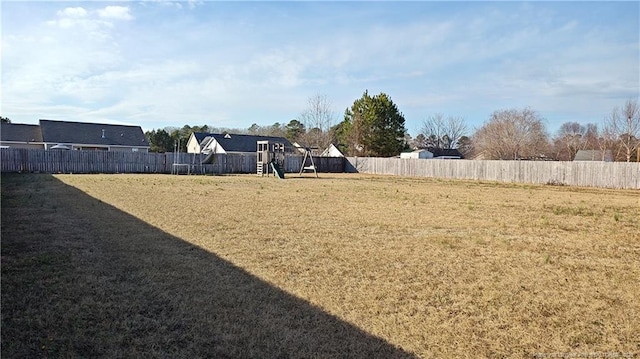 view of yard featuring a playground