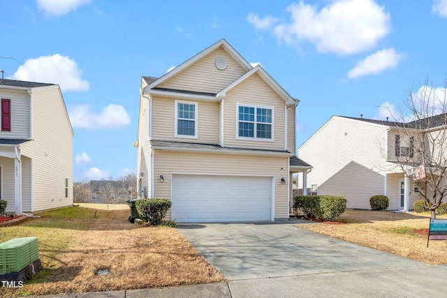 view of front property with a garage and a front lawn