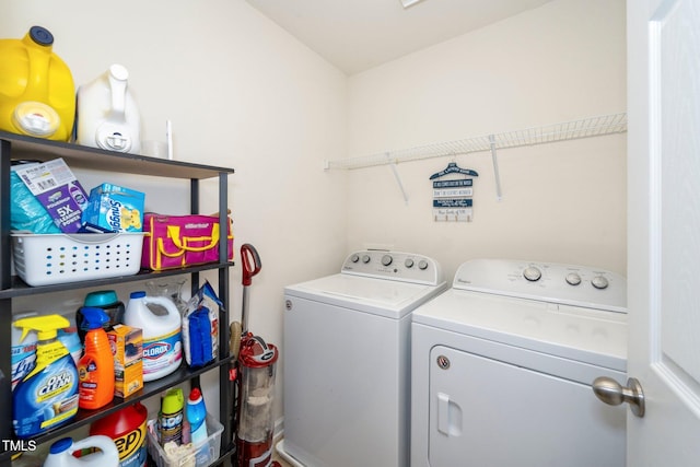 laundry room featuring washing machine and dryer