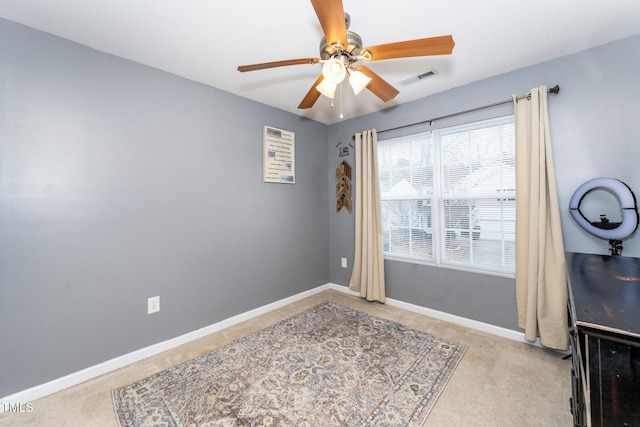 interior space featuring ceiling fan