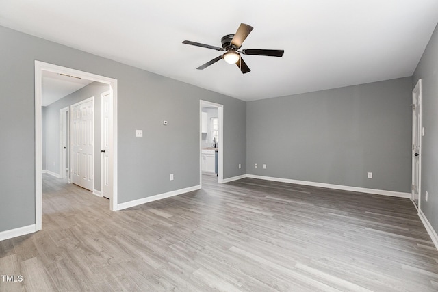 interior space featuring light hardwood / wood-style floors and ceiling fan