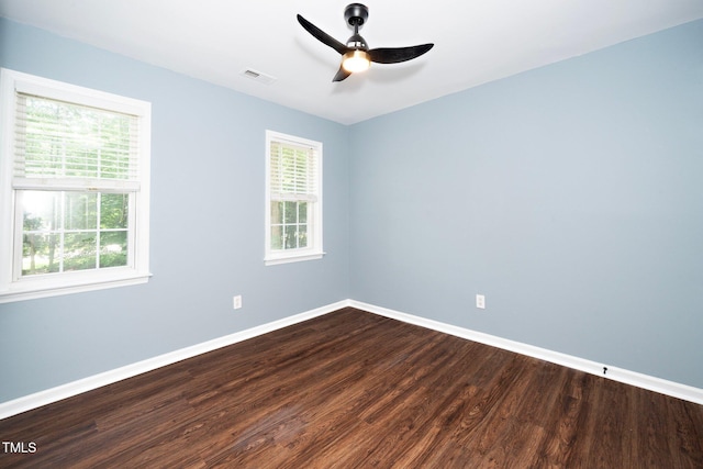 spare room featuring ceiling fan and wood-type flooring