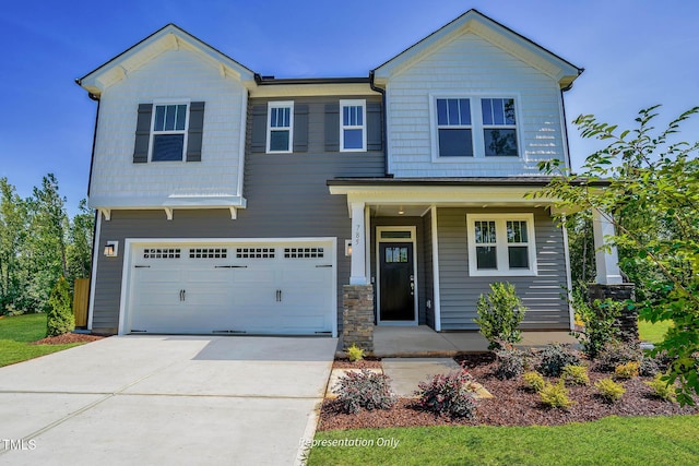 view of front of property with a garage