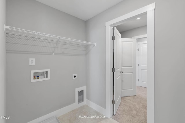 clothes washing area with light carpet, washer hookup, and hookup for an electric dryer