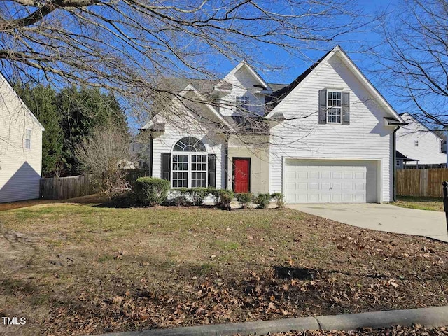 front facade featuring a front yard and a garage