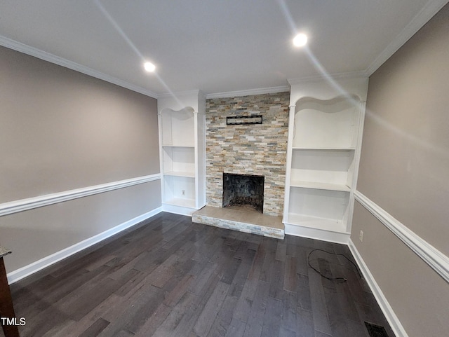 unfurnished living room with built in shelves, crown molding, and dark wood-type flooring