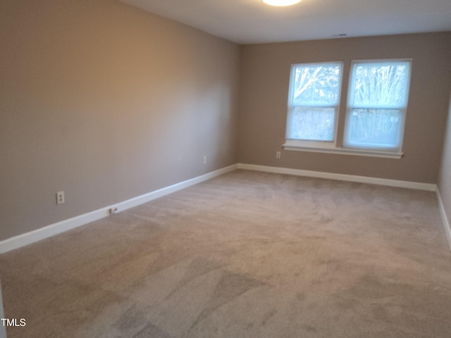 4300 Hickory Ridge Dr, Raleigh, NC 27609 - carpeted empty room with baseboards