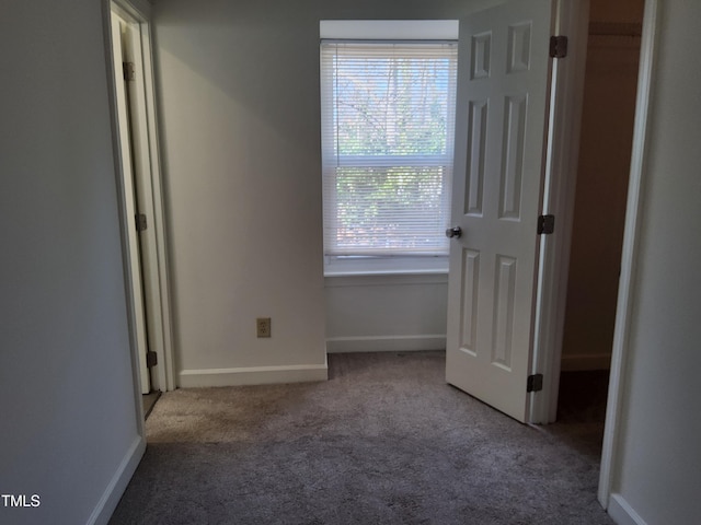 unfurnished bedroom featuring light colored carpet