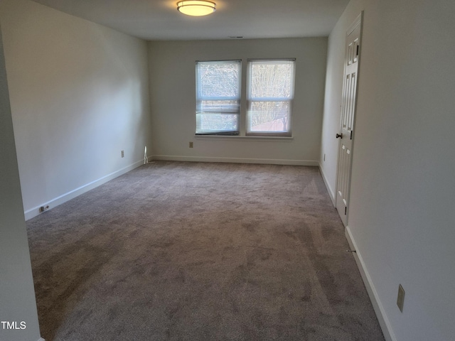 spare room featuring carpet flooring