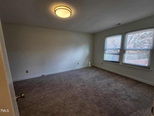 view of carpeted spare room