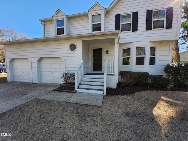 view of front of property featuring a garage