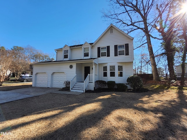 front of property with a garage