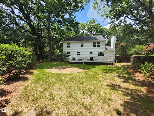 4300 Hickory Ridge Dr, Raleigh, NC 27609 - rear view of house featuring a chimney, a fenced backyard, and a deck
