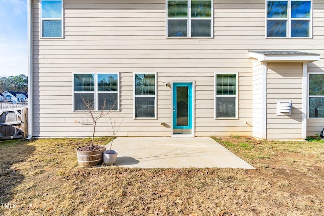 rear view of house featuring a patio