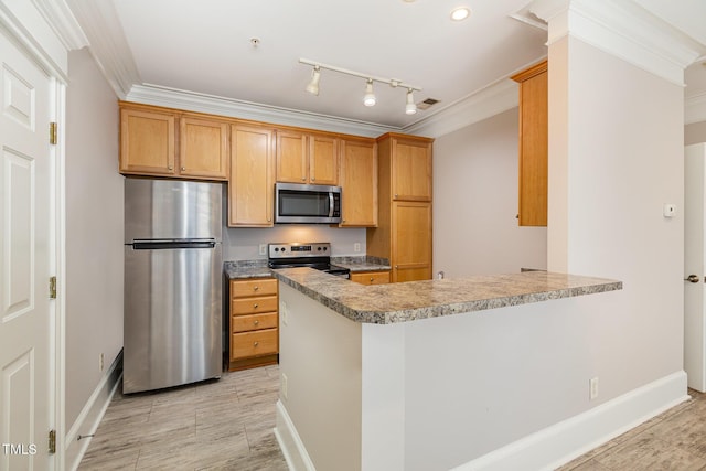 kitchen with kitchen peninsula, stainless steel appliances, and ornamental molding