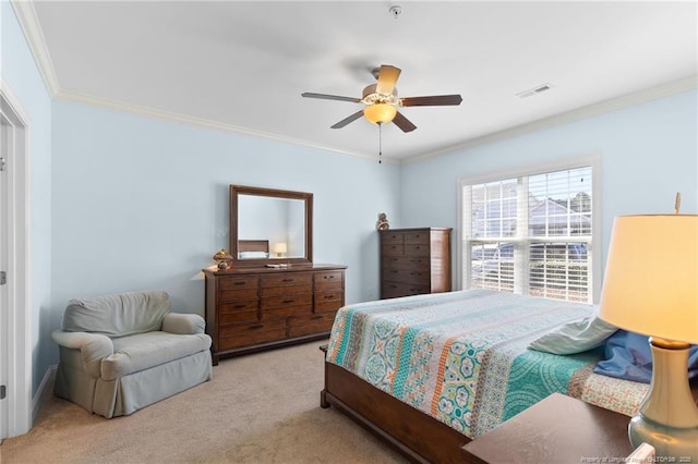 bedroom with light carpet, ceiling fan, and ornamental molding