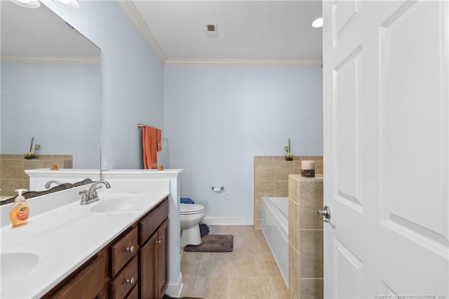 bathroom with vanity, a bathing tub, tile patterned floors, crown molding, and toilet