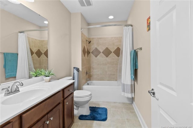 full bathroom featuring vanity, shower / tub combo, and toilet