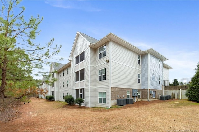 view of home's exterior featuring central AC unit