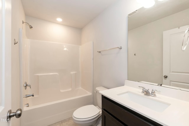 full bathroom with tile patterned floors, vanity,  shower combination, and toilet