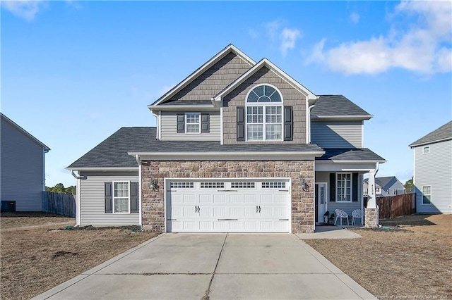 view of front of property with a garage