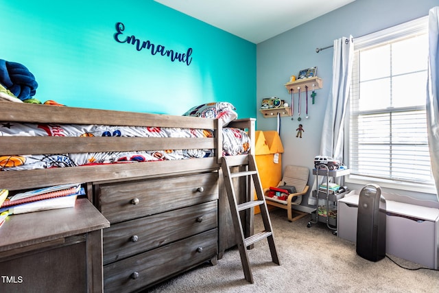 bedroom featuring light colored carpet