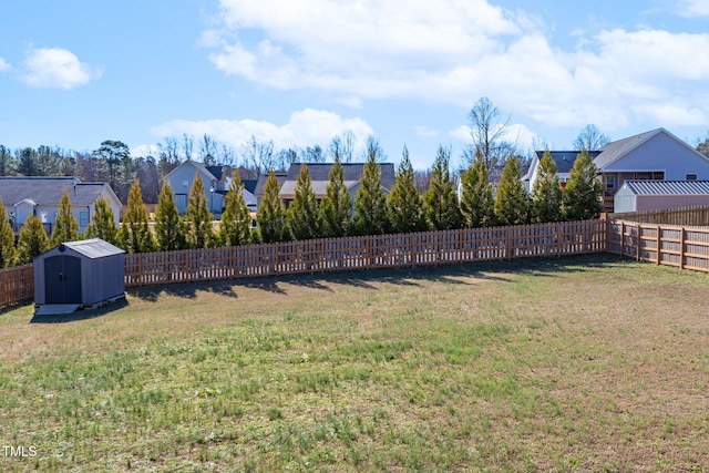 view of yard with a storage unit