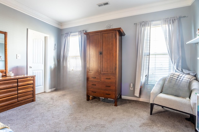 living area featuring crown molding, plenty of natural light, and light colored carpet