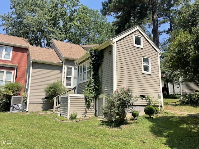 5718 Sentinel Dr, Raleigh, NC 27609 - view of side of home featuring a yard
