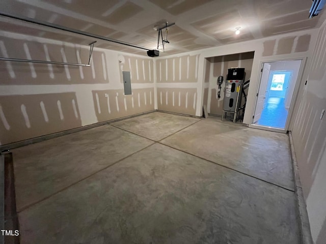 garage featuring electric panel and a garage door opener