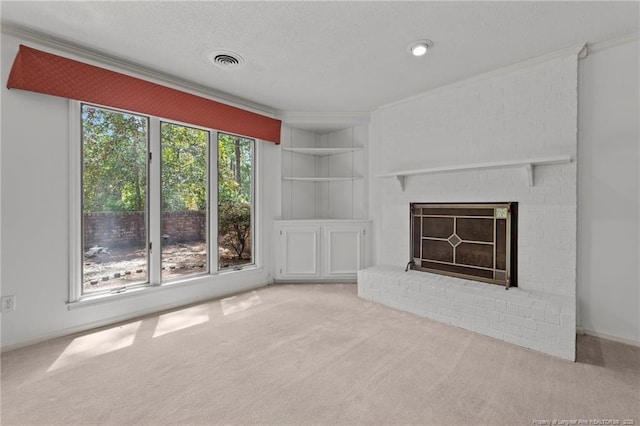 unfurnished living room featuring a fireplace, light carpet, and built in features