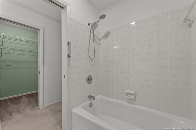 bathroom with shower / washtub combination