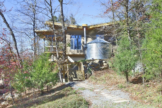 view of property exterior with stucco siding