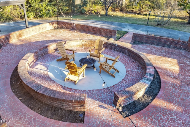 view of patio featuring an outdoor fire pit