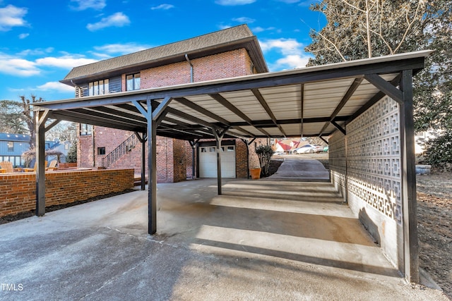 view of vehicle parking featuring a carport