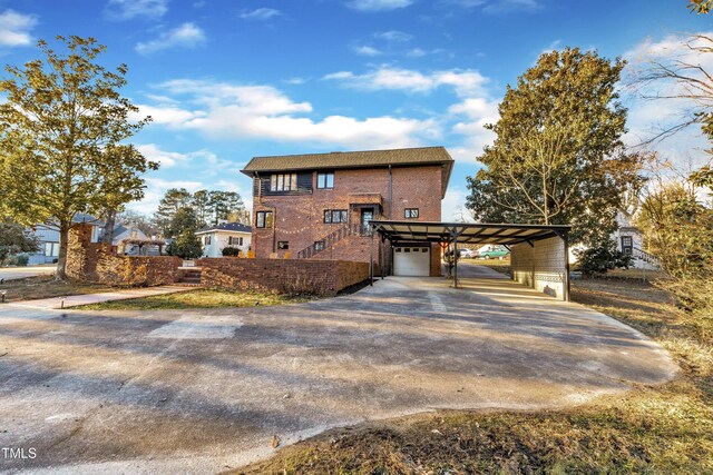 view of front of house featuring a carport