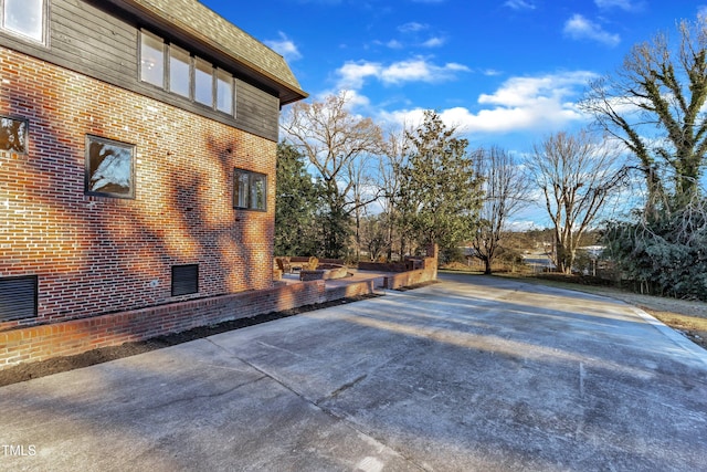 view of home's exterior featuring a patio area