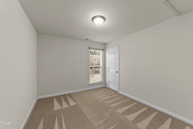 view of carpeted spare room