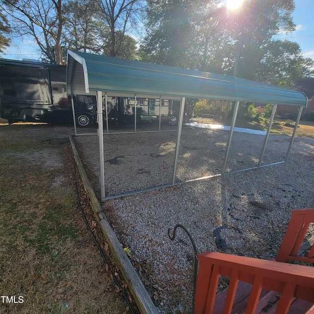 exterior space featuring a carport