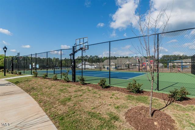 1009 Manorhaven Dr, Durham, NC 27703 - view of tennis court featuring community basketball court