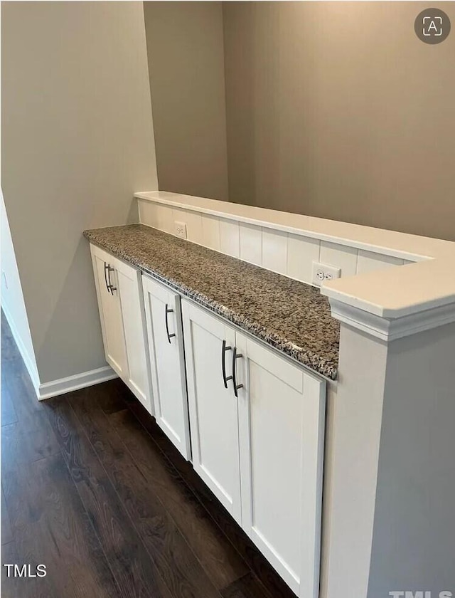 1009 Manorhaven Dr, Durham, NC 27703 - bathroom featuring wood finished floors and baseboards