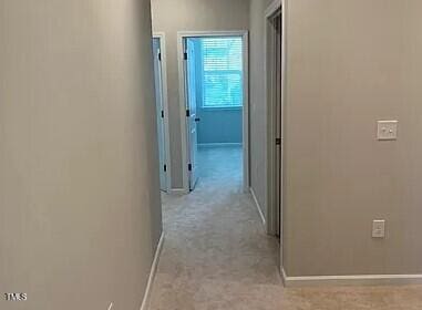 1009 Manorhaven Dr, Durham, NC 27703 - hall featuring light carpet