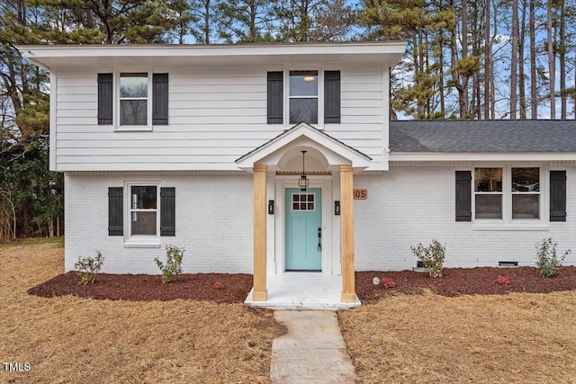 view of front property featuring a front yard