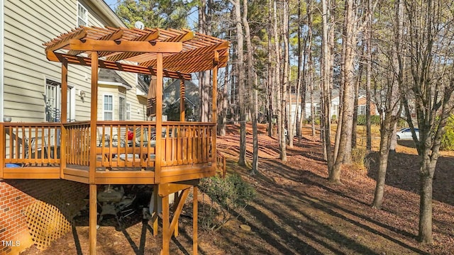 wooden terrace with a pergola