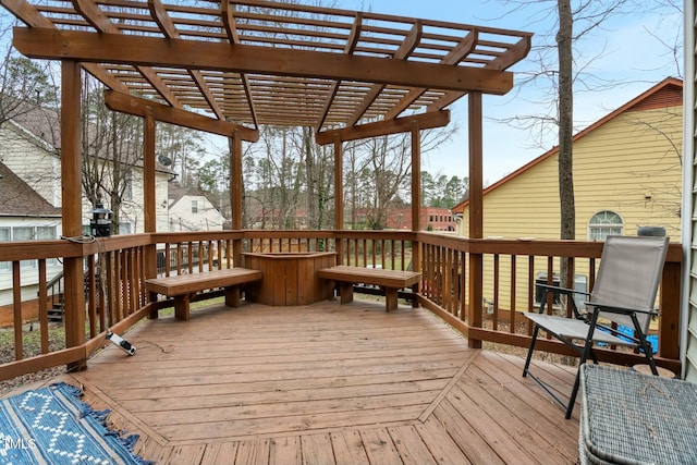 wooden terrace featuring a pergola