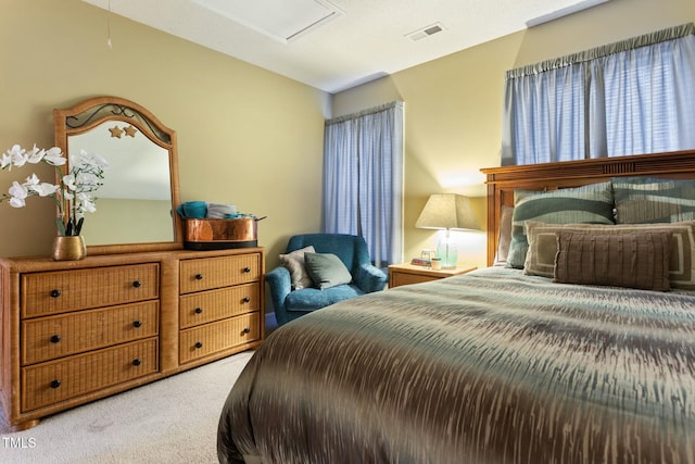 bedroom with light colored carpet