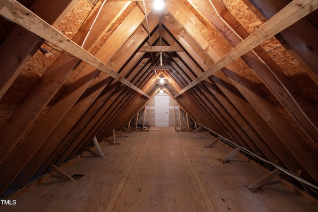 view of unfinished attic