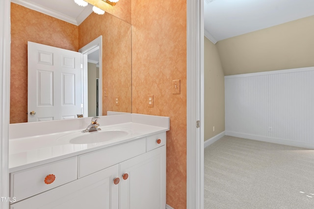 bathroom with vanity and crown molding