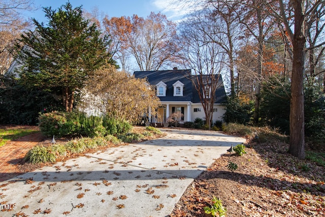 view of new england style home